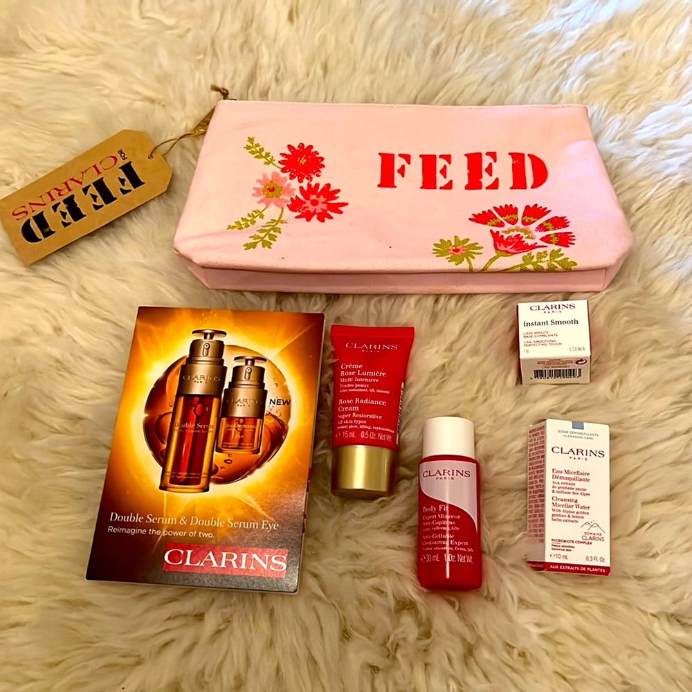 5 Clarins samples and cosmetics bag.